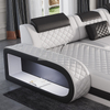 Canapé sectionnel à LED capitonné élégant pour les espaces restreints