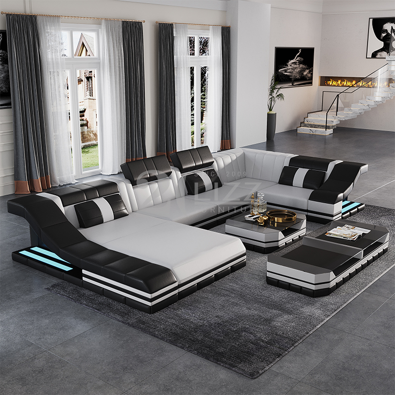 Sofa sectionnel mené en cuir en forme de U avec table basse